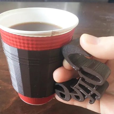 カップを持つ動作を助ける自助具